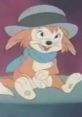 Banjo the Woodpile Cat, animated character with a playful expression, wearing a hat and blue scarf in a colorful setting.