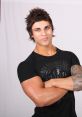 Zyzz posing confidently, showcasing his muscular physique and iconic style, embodying fitness inspiration.