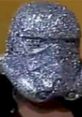 Shockmaster in a sparkly helmet, showcasing the iconic wrestling persona from the 1990s. Memorable character in wrestling history.