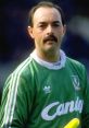 Bruce Grobbelaar Type your text to hear it in the voice of Bruce Grobbelaar. In the vibrant cacophony of a football stadium,