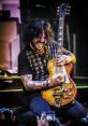 ⨁ Tracii Guns Guitarist. Type your text to hear it in the voice of ⨁ Tracii Guns