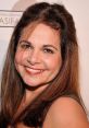 Candi Milo Type your text to hear it in the voice of Candi Milo. Candi Milo is an American voice actress celebrated for