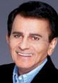 Iconic radio host Casey Kasem smiling, known for his engaging voice and the American Top 40 music countdown.