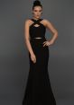 Elegant woman in a stylish black Uzun dress with cut-out details, perfect for evening events and formal occasions.