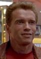 Arnold Schwarzenegger in a scene from "Last Action Hero," showcasing his iconic character's charm and charisma.