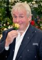 Christopher Biggins Type your text to hear it in the voice of Christopher Biggins. The first that fills the room is a