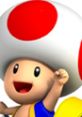 Toad from Mario Kart Wii, cheerfully celebrating with a big smile and iconic red-spotted mushroom cap.