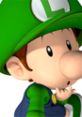 Baby Luigi from Mario Kart Wii, wearing a green hat, shows a curious expression while touching his lips thoughtfully.