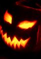 Glowing jack-o'-lantern with menacing face, perfect for Halloween festivities and spooky decorations.