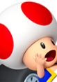 Toad from Mario Kart 7 celebrates with excitement, showcasing his signature red-spotted mushroom cap and vibrant kart design.