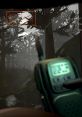 View of a dense forest with a handheld radio displaying time and coordinates, creating an eerie atmosphere in "Lethal Company.