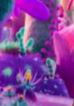 Colorful, whimsical landscape featuring bright purple plants and vibrant flora reminiscent of the Trolls universe.