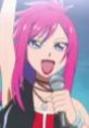 Misaki Ayane from Kira Kira Pretty Cure A La Mode passionately sings into a microphone, showcasing her vibrant personality.