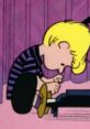 Schroeder's focus on piano keys, showcasing his passion for music in the classic 1963-65 "Peanuts" animation.