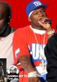 G-Unit featuring Joe in "Wanna Get To Know You," showcasing iconic hip-hop style and vibrant energy.