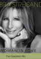 Barbra Streisand smiling elegantly, featured on the cover of "Woman in Love - The Greatest Hits" album.