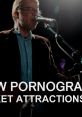 The New Pornographers perform "High Ticket Attractions" live, showcasing their dynamic stage presence and energizing music.