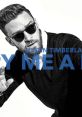 Justin Timberlake wearing sunglasses, featured in "Cry Me A River" promotional artwork. Stylish and iconic music visual.