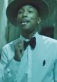 Pharrell Williams - Happy Pharrell Williams' infectious hit song "Happy" took the world by storm with its feel-good vibes and