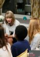 Taylor Swift engages in a heartfelt conversation, reflecting on childhood bullying experiences with friends.