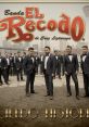 Banda El Recodo de Cruz Lizárraga poses in formal attire, showcasing their iconic style and musical legacy.