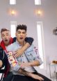 One Direction's "Best Song Ever" featuring playful interaction between band members, showcasing their fun chemistry and style.