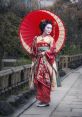 Elegant geisha in traditional attire holding a red parasol, standing on a serene stone path amidst lush greenery.