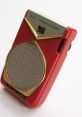 Vintage Real Tone six-transistor radio in vibrant red, featuring a classic design and gold accents for retro enthusiasts.