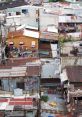 Overhead view of a densely populated slum area with makeshift homes, rusty roofs, and hanging laundry.