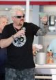 Fieri The unmistakable voice of Guy Fieri can be heard in the first clip, exclaiming, "Guy Fieri three way!" His