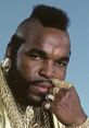 Mr. T showcasing his iconic look with bold jewelry and a striking mohawk, embodying 80s pop culture excellence.