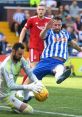 Dramatic football action between players, capturing a key moment of Aberdeen FC in a competitive match.