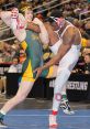 Wrestlers compete fiercely on the mat, showcasing strength and technique at a major wrestling championship event.