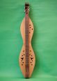 Dulcimer The soft plucking of the strings on the dulcimer fills the air with a melodic and soothing tune. The gentle yet