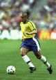 Roberto Carlos AMIGOS ROBERTO CARLOS. The crowd erupts in cheers as the legendary Brazilian singer steps onto the stage. The