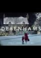 Debenhams festive scene featuring a mother and child in winter coats, highlighting holiday shopping magic and cheer.