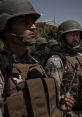 Soldiers in tactical gear stand at attention, showcasing a disciplined military presence, reminiscent of "Army of Darkness.