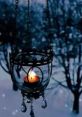 Vintage lantern with a glowing candle, surrounded by a serene winter landscape, creating a cozy ambiance for relaxation.