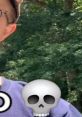 Person wearing glasses near a playful skull emoji, representing Ohio Goofy Ahh humor in a natural setting.