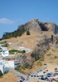 Lindos The streets of Lindos are filled with the melodic of locals and tourists alike exclaiming "Ai que lindos" as they