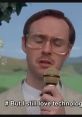 Scene from Napoleon Dynamite featuring a character passionately speaking into a microphone about loving technology.