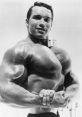 Arnold Schwarzenegger showcasing impressive physique in classic bodybuilding pose, epitomizing the golden era of fitness.