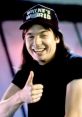 Wayne Campbell from Wayne's World giving a thumbs up, wearing a Wayne's World cap, exuding fun and excitement.