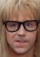 Close-up of Garth Algar, iconic character from Wayne's World, showcasing his signature glasses and distinctive hairstyle.