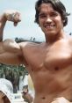 Arnold Schwarzenegger flexing muscles outdoors, capturing the essence of strength in "Prank Call: Arnold Schwarzenegger 3.