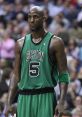 Kevin Garnett in a Boston Celtics jersey, showcasing intense focus during an NBA game, symbolizing high performance and dedication.