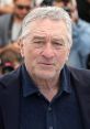 Robert De Niro seen at a film event, showcasing his distinguished look and seasoned presence in the entertainment industry.