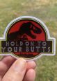 Hold On To Your Butts "Hold on to your butts" - the iconic line delivered by Samuel L. Jackson in the movie Jurassic Park