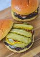 Cheese Burger Have you ever heard the satisfying sizzle of a juicy burger patty hitting a hot grill? The of the meat