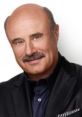 Dr. Phil, renowned host and psychologist, smiles confidently in a tailored black suit with a friendly demeanor.